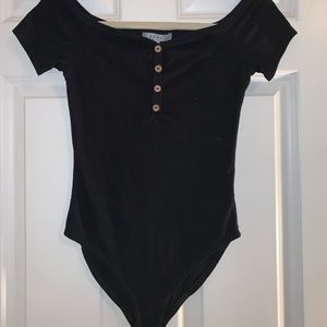 Black gently used body suit.